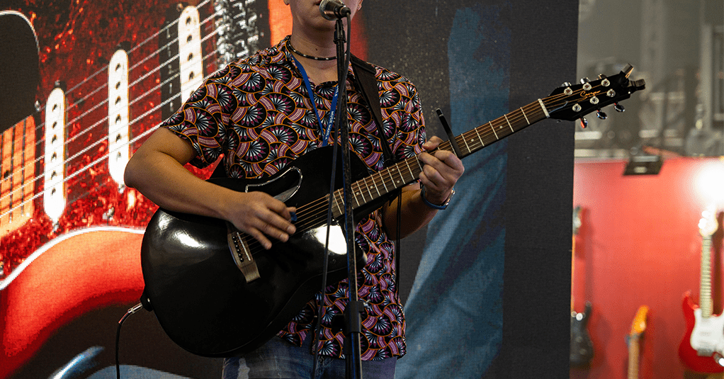 Men singing with guitar